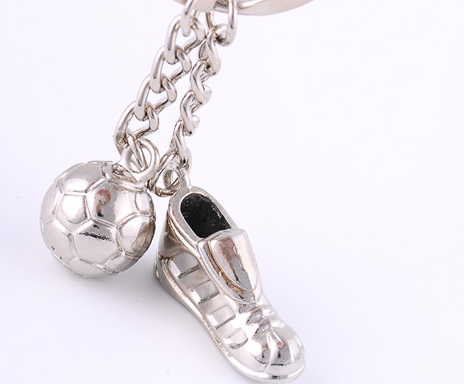 Football shoes and soccer keychain