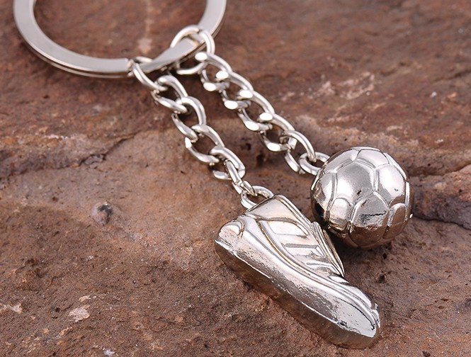 Football shoes and soccer keychain