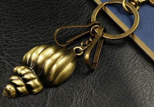 Bronze conch shell keychain