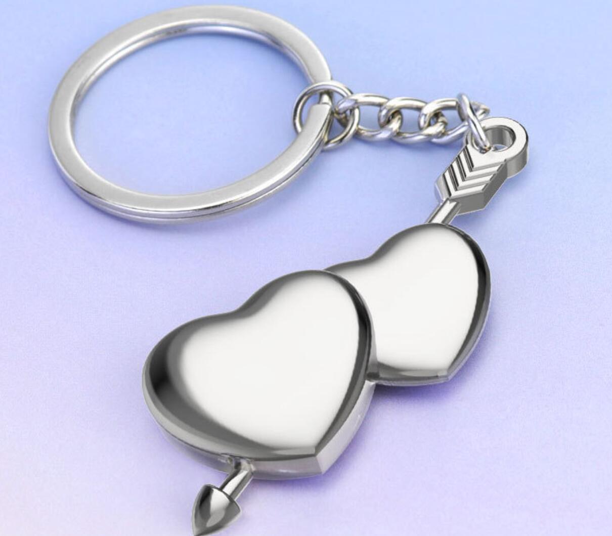 An Arrow Pierces Double Heart Keychain