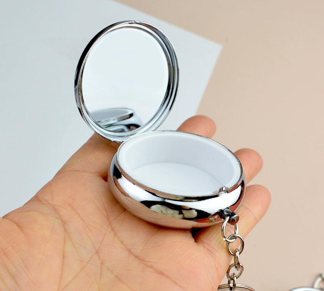 Mini medicine storage box with mirror keychain