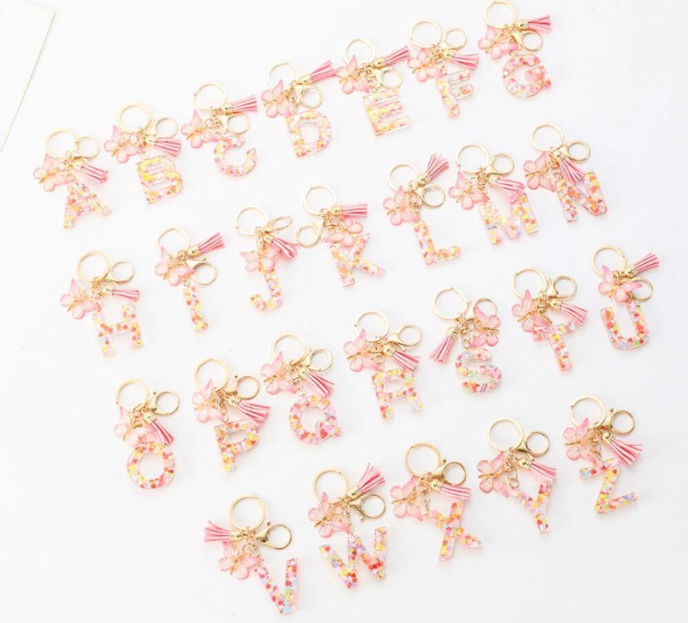 Pink butterfly sequin resin 26-letter keychain