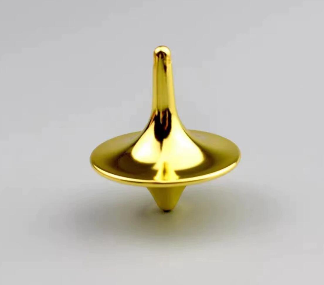 Mini alloy stress toy fingertip spinning top