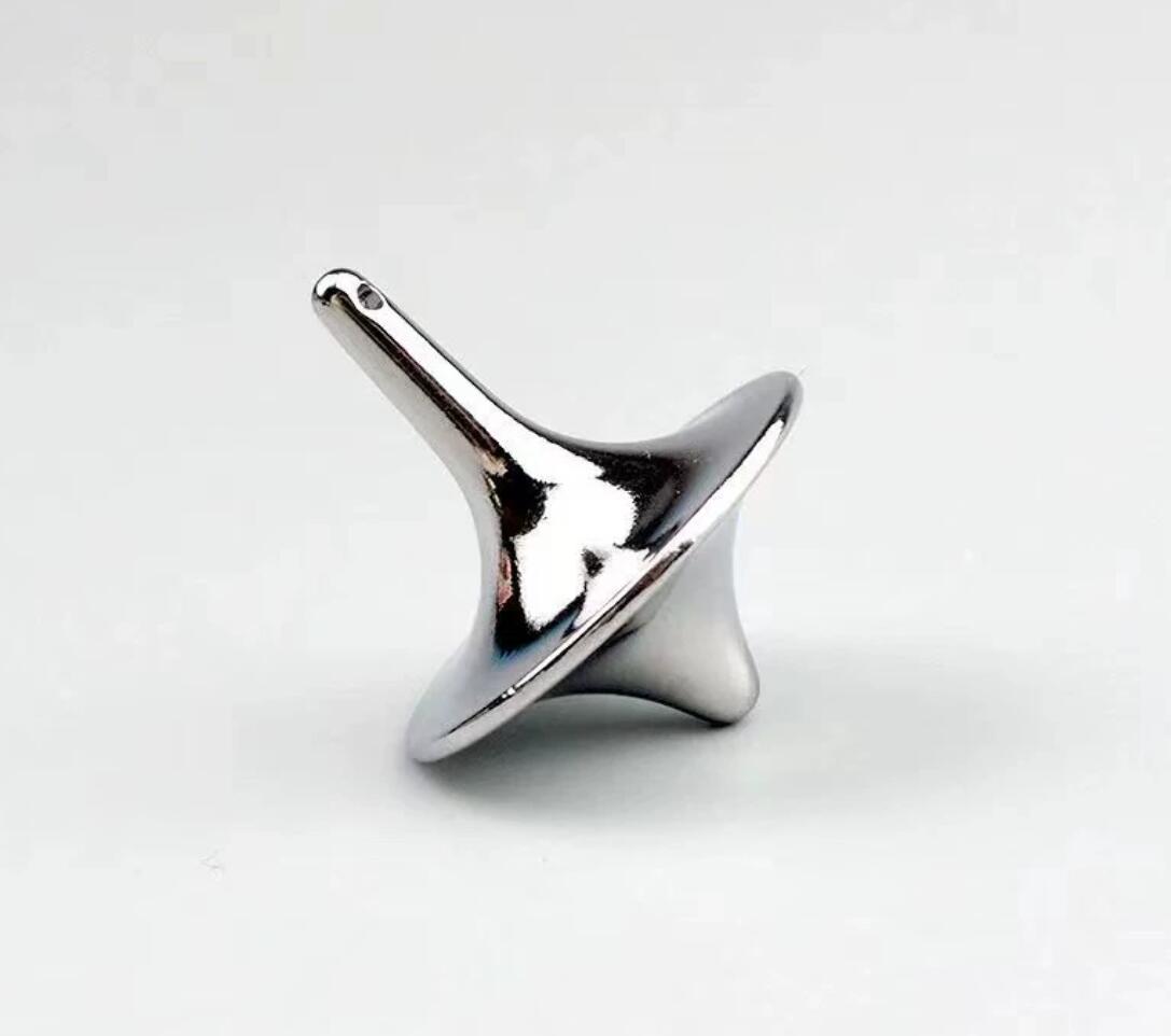 Mini alloy stress toy fingertip spinning top