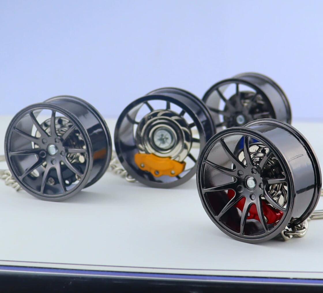 Metal wheel hub with brake keychain