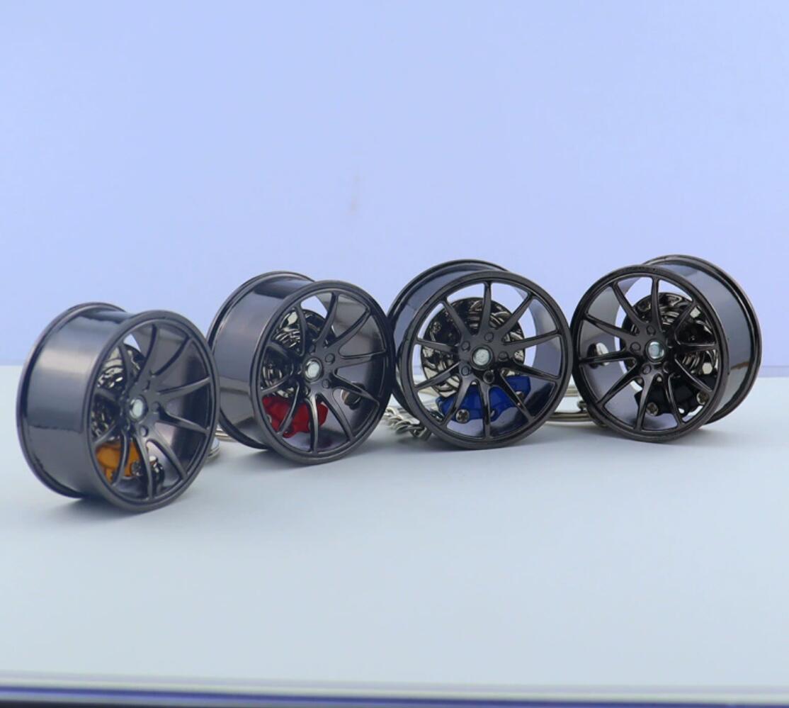 Metal wheel hub with brake keychain