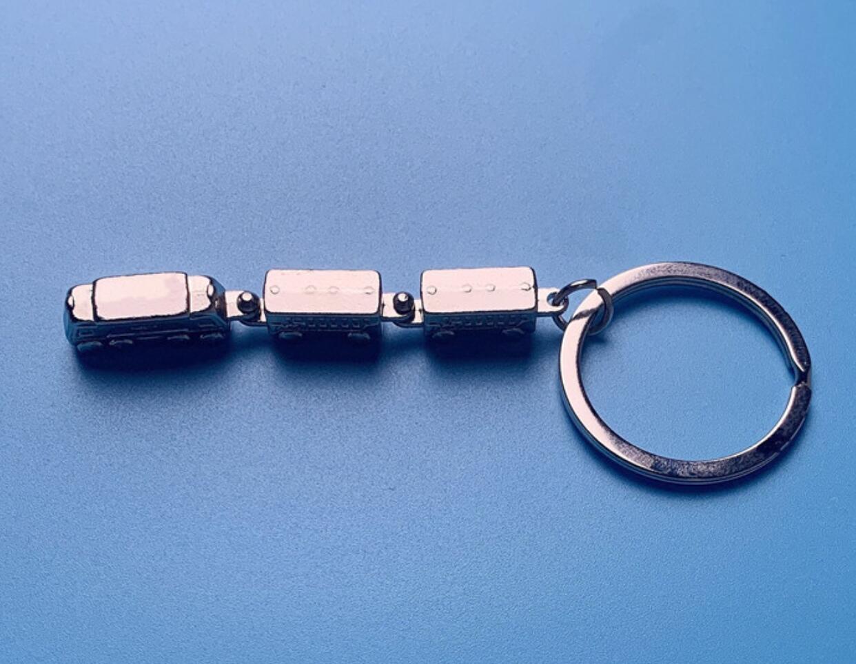 Metal movable joint train keychain