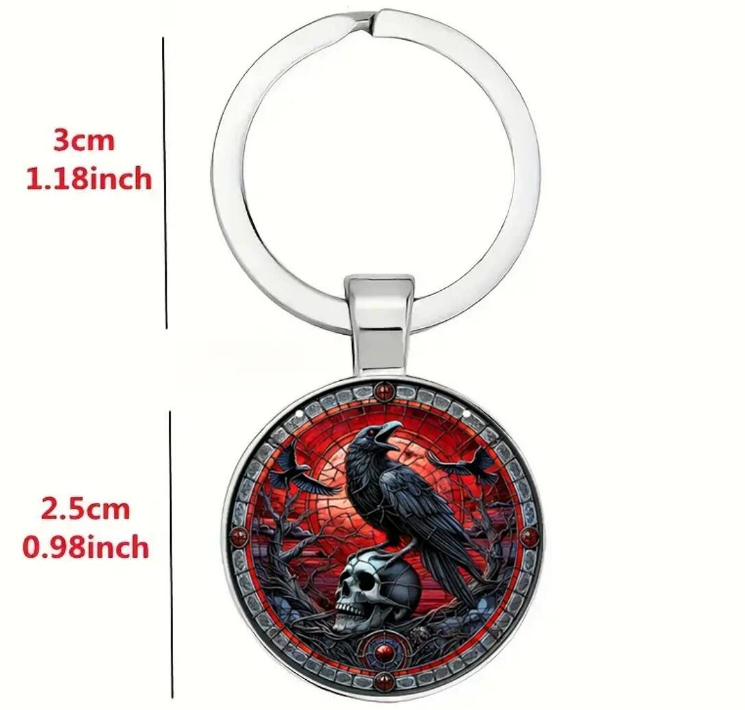standing on the skull black crow keychain