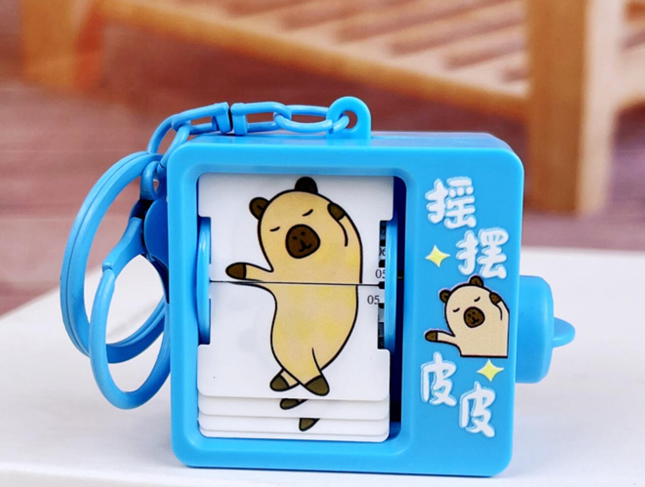 Fun book flipping animation machine keychain