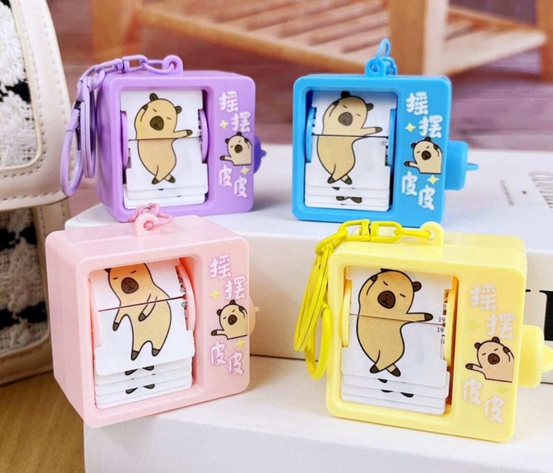 Fun book flipping animation machine keychain